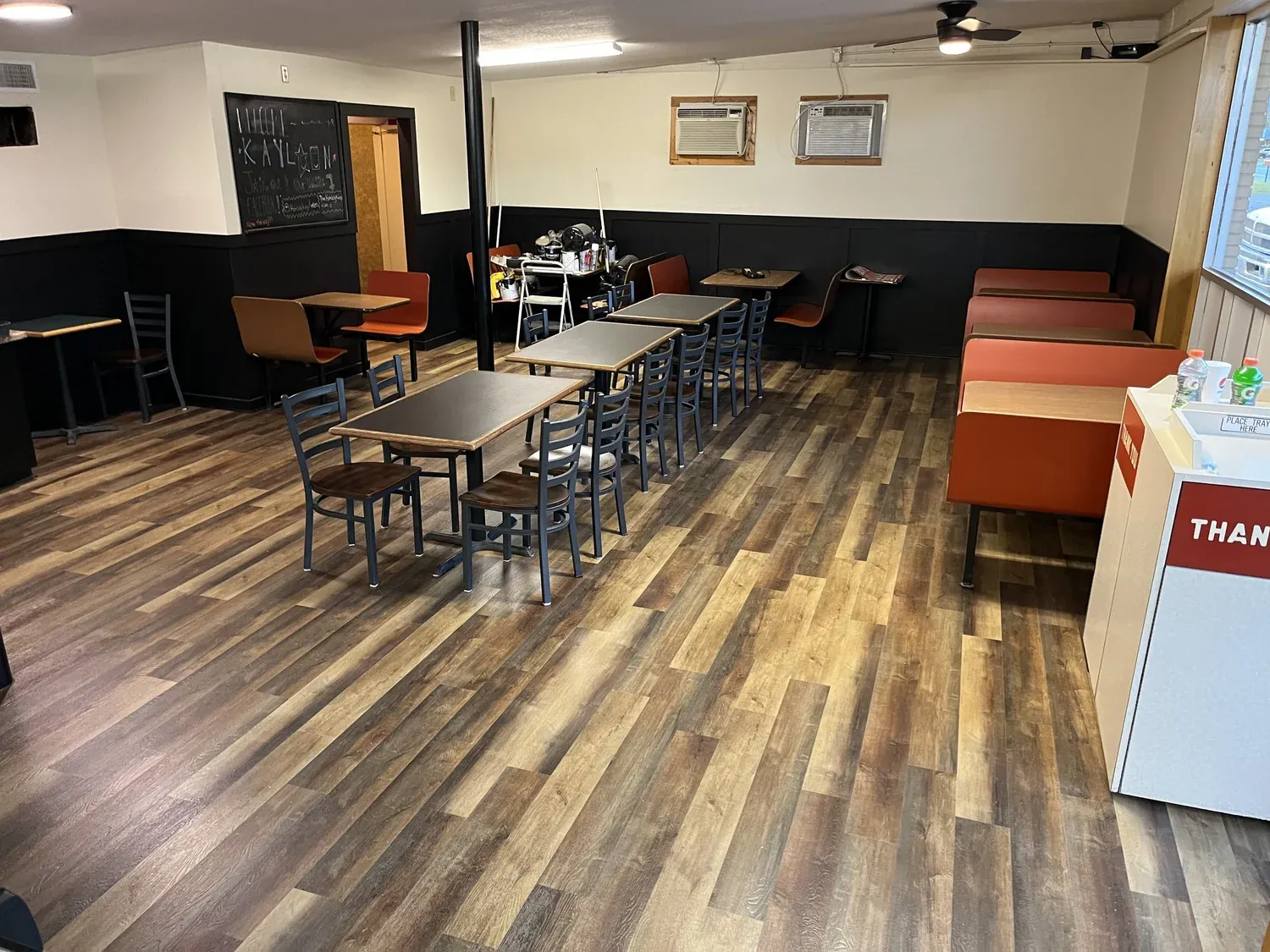 Commercial vinyl plank flooring in a restaurant dining room